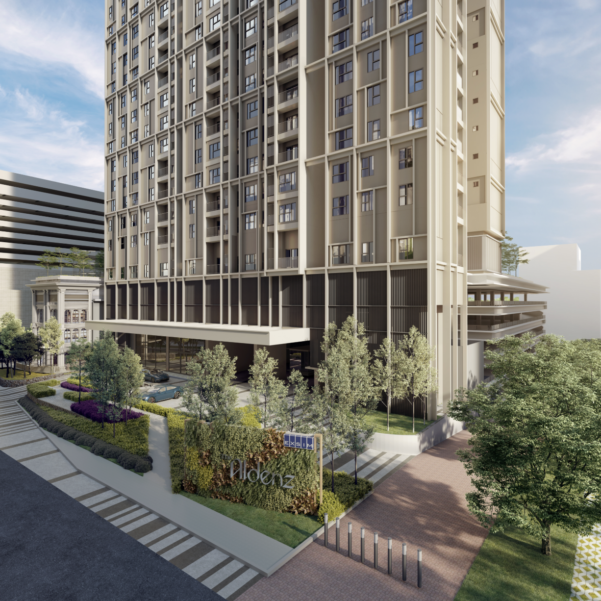 The arrival entrance of The Aldenz serviced residence at Central Park Damansara, with a covered porte-cochère and landscaped forecourt